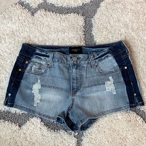 Celebrity Pink. Blue/dark blue shorts.